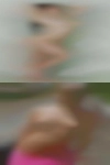 Naked woman playing guitar